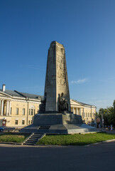 Fototapeta na wymiar VLADIMIR, RUSSIA - AUGUST, 17, 2022: Cathedral Square in the old town with a stele with bronze statues on a sunny summer day and copy space