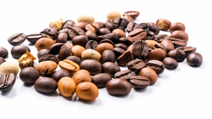 Close-up of fresh coffee beans on white background