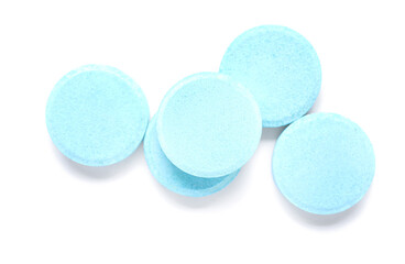 Blue soluble tablets isolated on white background