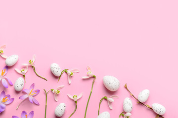 Composition with beautiful spring flowers and Easter eggs on pink background