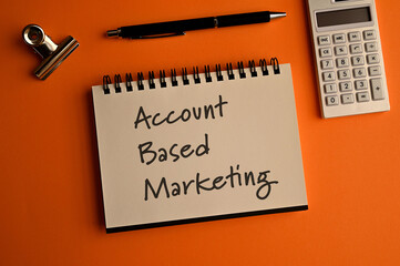 There is a notebook with the word Account Based Marketing. It is eye-catching image.