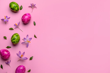 Obraz na płótnie Canvas Creative composition with painted Easter eggs, beautiful crocus flowers and plant leaves on pink background