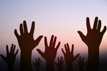 silhouette of the detainee's hand raise up for help to want freedom