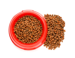 Red bowl of dry pet food on white background, closeup