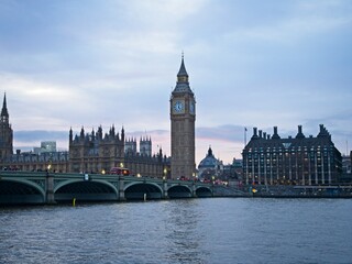 Big Ben looms over the Westminster Bridge and the Palace of Westminster, home of the UK parliament.