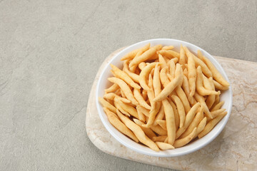 Widaran Keju or Telur Gabus Keju, Indonesian traditional snack made from flour, egg, and cheddar cheese. 
