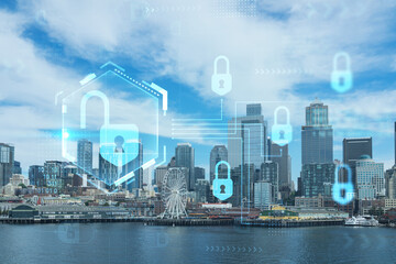 Fototapeta na wymiar Seattle skyline with waterfront view. Skyscrapers of financial downtown at day time, Washington, USA. The concept of cyber security to protect confidential information, padlock hologram