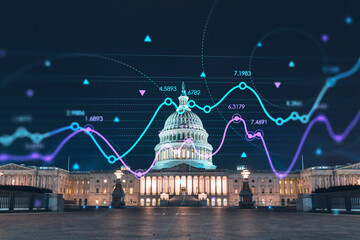 Front view, Capitol dome building at night, Washington DC, USA. Illuminated Home of Congress and Capitol Hill. Forex graph hologram. The concept of internet trading, brokerage and fundamental analysis