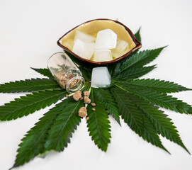 Bubble Hash on Cannabis Leaves with White Background