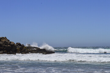 waves crashing on rocks