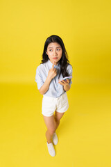 Fototapeta na wymiar image of asian woman on a yellow background