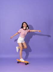 Fototapeta na wymiar beautiful young girl on purple background