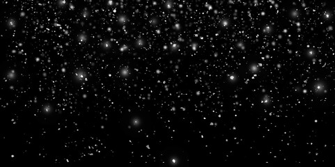 Flying dust particles on a black background. Black white bokeh. Bokeh lights on a black background. Snow fall background