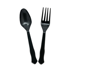 Isolated black plastic spoon and fork on white background, flat lay image, black plastic spoon and fork for takeaway food.