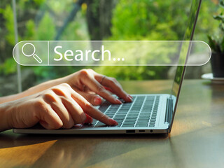 Hands of young Asian women who are Find internet browsing data. global internet network