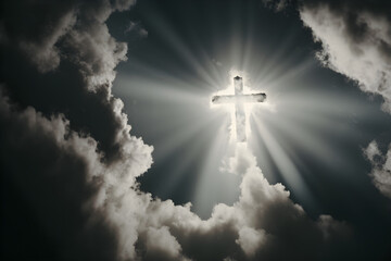 The cross glows in the heavenly sky, illuminated by rays of sunshine