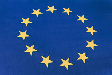 International community symbol of EU background. European union official textile blue flag with star.