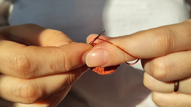 Women's hands knit crochet. Home needlework, hobby. Cotton yarn. Close-up video.