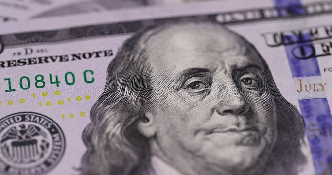 One hundred American dollars close-up, details of a genuine American 100 banknote