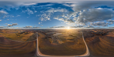 aerial full seamless spherical hdri 360 panorama view from great height above fields in countryside...