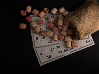 Lotto board game on black background.