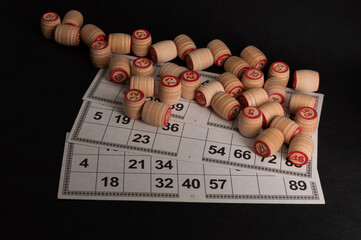 Lotto board game on black background.