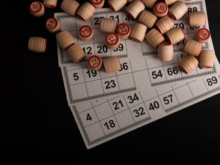 Lotto board game on black background.