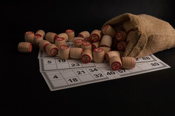 Lotto board game on black background.