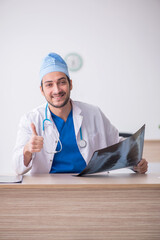 Young male doctor radiologist working in the clinic