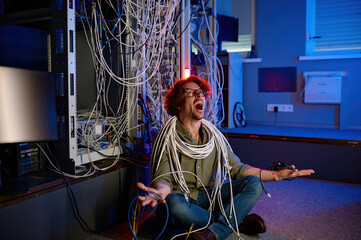 Stressed computer engineer trying to understand network mess