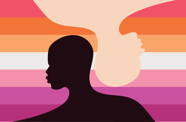 Silhouette of interracial couple over lesbian flag background.