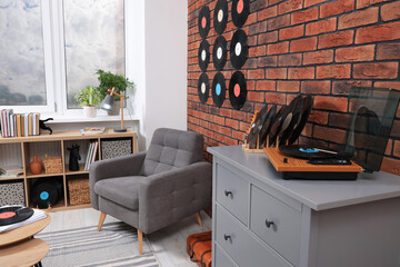 Living room decorated with vinyl records. Interior design