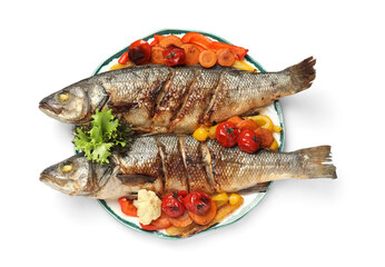 Plate with delicious baked sea bass fish and vegetables on white background, top view