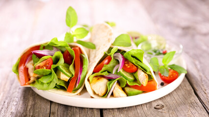 Healthy Tex-Mex tortilla wraps with chicken and vegetables