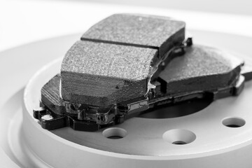 brake discs and pads on a white background