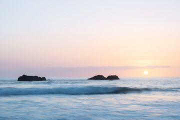 Naklejka premium sunset over the ocean with rocks. west coast of the island of La Palma, Spain