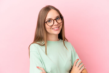 Young Lithuanian woman isolated on pink background With glasses with happy expression