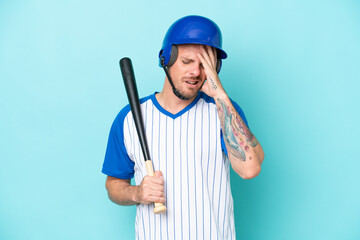 Baseball player with helmet and bat isolated on blue background with headache