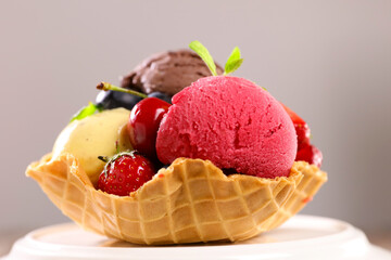 Delicious ice cream scoop with fresh fruits