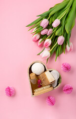 Natural Eco Friendly Home Spa Products on Pink Background.