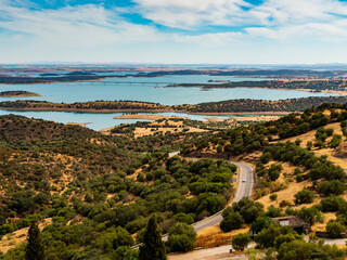 Wonderful landscape with rolling hills and Alqueva lake in background, Monsaraz, Portugal 