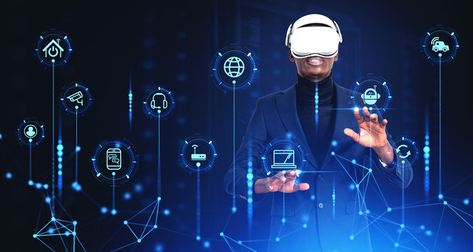 Businessman in vr glasses, IOT hologram with digital icons, devi