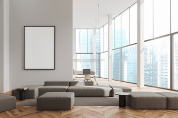 White office lounge with sofa and poster
