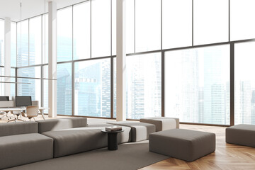 Fototapeta na wymiar Cozy office interior with lounge zone with workplace near panoramic window