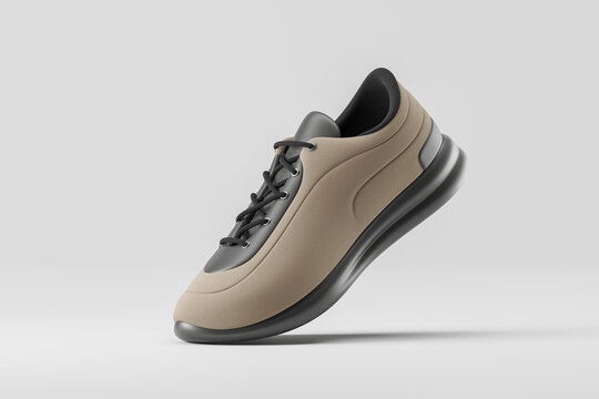 Beige and black sport shoe over gray
