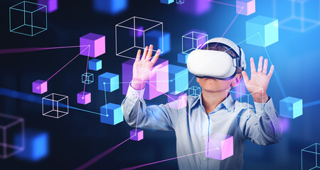 Boy in vr glasses touching data blocks in cyberspace, metaverse