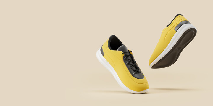 Yellow and black sport shoes over beige
