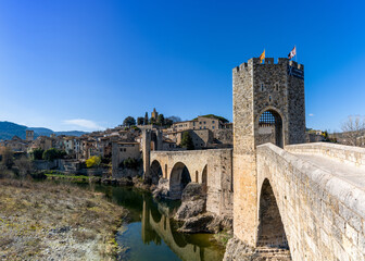 Fototapeta na wymiar view of the medieval Romanesque bridge and village of Besalu in Catalonia