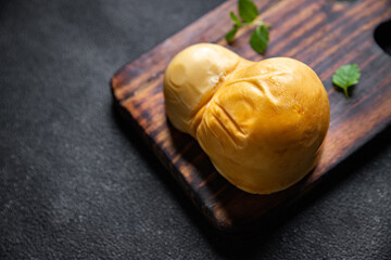 scamorza cheese smoked flavor healthy meal food snack on the table copy space food background rustic top view