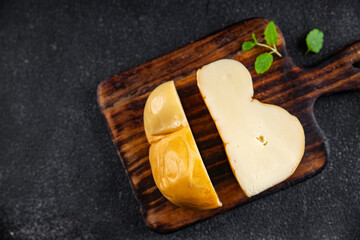 scamorza cheese smoked flavor healthy meal food snack on the table copy space food background rustic top view